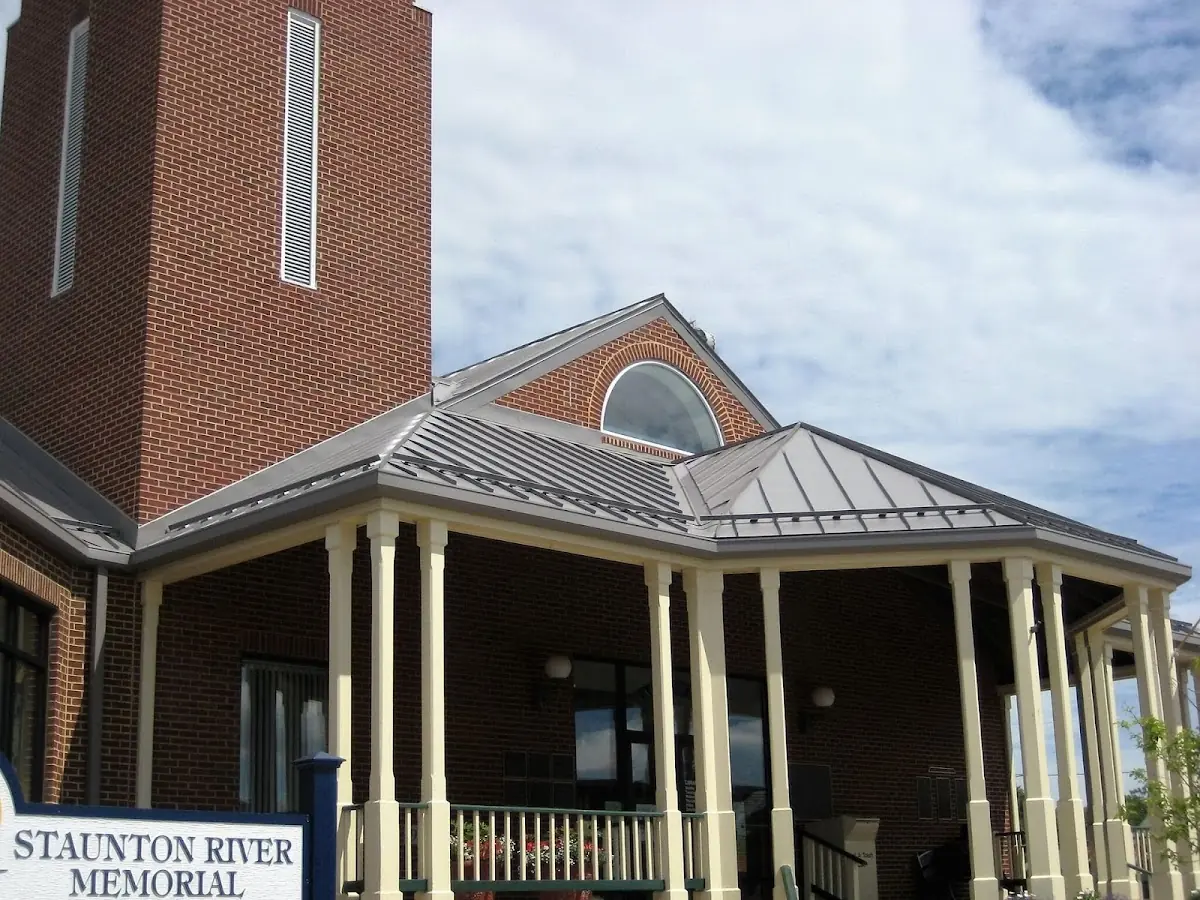 Skilled roofing craftsmen working on a residential roof in Cannelton
